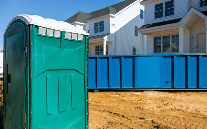 portable toilet and dumpster at a construction site project in Bloomfield NJ